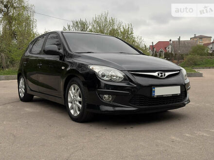 Хендай i30 2010 у Житомирі на Automoto.ua Чорний Хендай i30, об'ємом двигуна 1.6 л та пробігом 225 тис. км за 6500 $, фото 1 на Automoto.ua