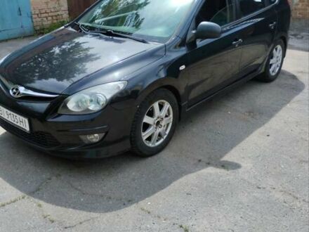 Чорний Хендай i30, об'ємом двигуна 1.4 л та пробігом 176 тис. км за 5700 $, фото 1 на Automoto.ua