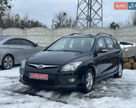 Черный Хендай i30, объемом двигателя 1.6 л и пробегом 204 тыс. км за 6600 $, фото 1 на Automoto.ua