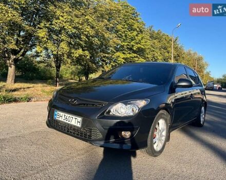 Черный Хендай i30, объемом двигателя 1.6 л и пробегом 219 тыс. км за 4700 $, фото 1 на Automoto.ua