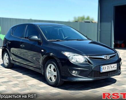 Чорний Хендай i30, об'ємом двигуна 1.6 л та пробігом 257 тис. км за 6300 $, фото 1 на Automoto.ua