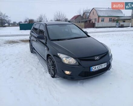Черный Хендай i30, объемом двигателя 1.6 л и пробегом 247 тыс. км за 5900 $, фото 1 на Automoto.ua
