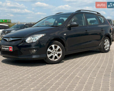 Черный Хендай i30, объемом двигателя 1.4 л и пробегом 223 тыс. км за 5300 $, фото 1 на Automoto.ua