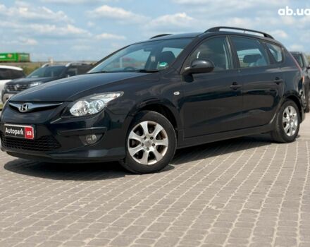 Чорний Хендай i30, об'ємом двигуна 1.4 л та пробігом 223 тис. км за 5990 $, фото 1 на Automoto.ua