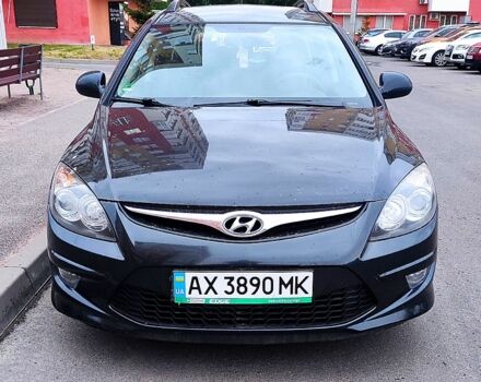 Чорний Хендай i30, об'ємом двигуна 1.4 л та пробігом 204 тис. км за 5700 $, фото 1 на Automoto.ua