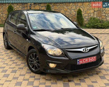 Чорний Хендай i30, об'ємом двигуна 1.4 л та пробігом 170 тис. км за 5950 $, фото 1 на Automoto.ua