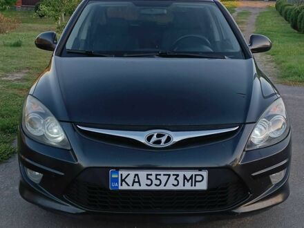 Черный Хендай i30, объемом двигателя 1.6 л и пробегом 164 тыс. км за 7300 $, фото 1 на Automoto.ua
