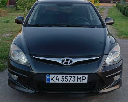 Черный Хендай i30, объемом двигателя 1.6 л и пробегом 164 тыс. км за 7300 $, фото 1 на Automoto.ua