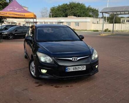 Черный Хендай i30, объемом двигателя 1.4 л и пробегом 196 тыс. км за 6800 $, фото 1 на Automoto.ua