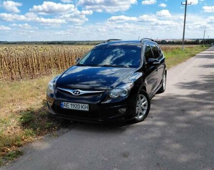 Черный Хендай i30, объемом двигателя 1.58 л и пробегом 248 тыс. км за 7200 $, фото 1 на Automoto.ua