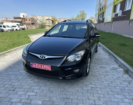 Черный Хендай i30, объемом двигателя 1.6 л и пробегом 105 тыс. км за 9500 $, фото 1 на Automoto.ua