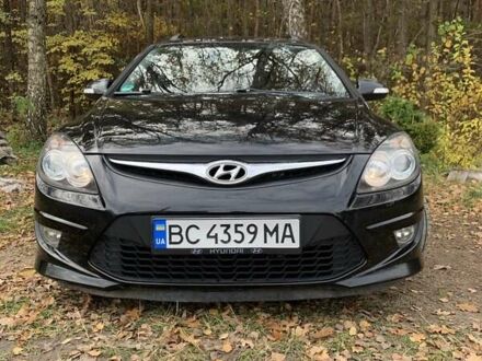 Черный Хендай i30, объемом двигателя 1.58 л и пробегом 235 тыс. км за 6700 $, фото 1 на Automoto.ua