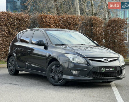 Черный Хендай i30, объемом двигателя 1.6 л и пробегом 180 тыс. км за 6700 $, фото 1 на Automoto.ua