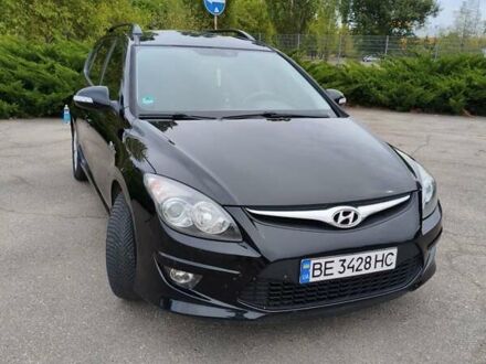Черный Хендай i30, объемом двигателя 1.4 л и пробегом 137 тыс. км за 7500 $, фото 1 на Automoto.ua