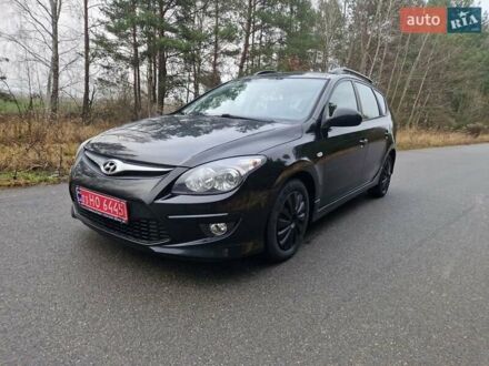 Черный Хендай i30, объемом двигателя 1.6 л и пробегом 232 тыс. км за 7000 $, фото 1 на Automoto.ua