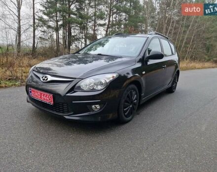 Чорний Хендай i30, об'ємом двигуна 1.6 л та пробігом 232 тис. км за 7000 $, фото 1 на Automoto.ua