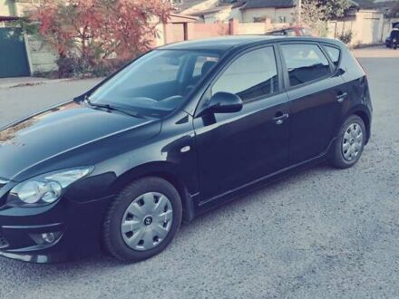 Черный Хендай i30, объемом двигателя 1.4 л и пробегом 210 тыс. км за 5600 $, фото 1 на Automoto.ua