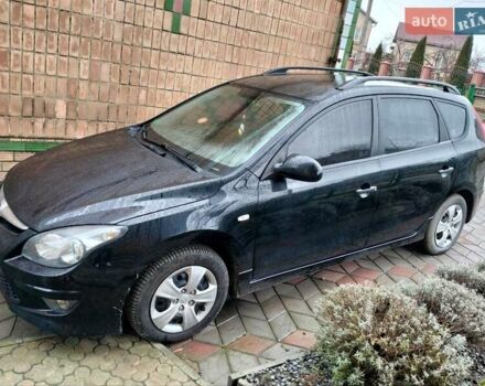 Черный Хендай i30, объемом двигателя 1.4 л и пробегом 157 тыс. км за 7100 $, фото 1 на Automoto.ua