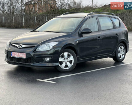 Чорний Хендай i30, об'ємом двигуна 1.6 л та пробігом 186 тис. км за 8900 $, фото 1 на Automoto.ua