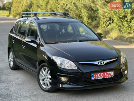 Черный Хендай i30, объемом двигателя 1.6 л и пробегом 239 тыс. км за 6750 $, фото 1 на Automoto.ua