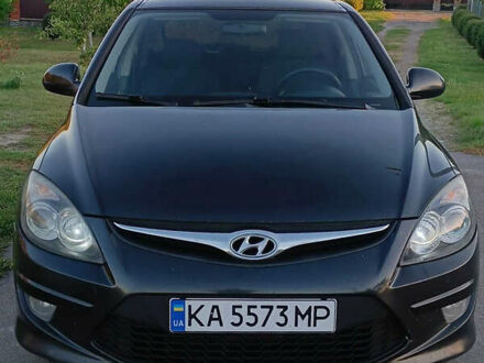 Черный Хендай i30, объемом двигателя 1.59 л и пробегом 180 тыс. км за 7000 $, фото 1 на Automoto.ua