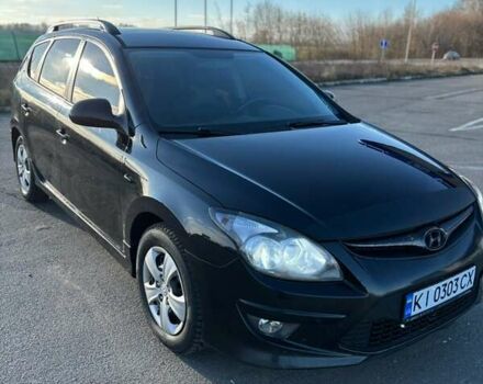 Черный Хендай i30, объемом двигателя 1.6 л и пробегом 255 тыс. км за 6500 $, фото 1 на Automoto.ua