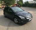 Чорний Хендай i30, об'ємом двигуна 1.6 л та пробігом 157 тис. км за 7900 $, фото 1 на Automoto.ua