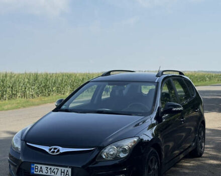 Черный Хендай i30, объемом двигателя 1.58 л и пробегом 241 тыс. км за 6999 $, фото 1 на Automoto.ua