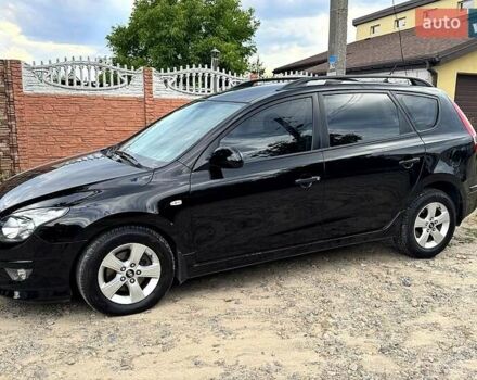 Черный Хендай i30, объемом двигателя 1.6 л и пробегом 209 тыс. км за 7300 $, фото 1 на Automoto.ua