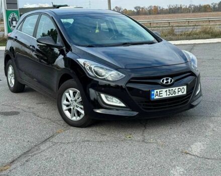 Черный Хендай i30, объемом двигателя 1.6 л и пробегом 105 тыс. км за 8999 $, фото 1 на Automoto.ua