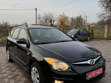Черный Хендай i30, объемом двигателя 1.4 л и пробегом 210 тыс. км за 6750 $, фото 1 на Automoto.ua