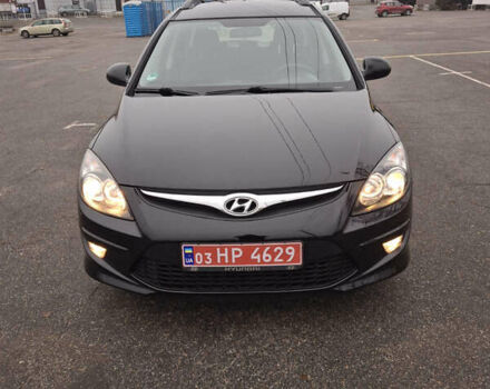 Черный Хендай i30, объемом двигателя 1.4 л и пробегом 209 тыс. км за 6850 $, фото 1 на Automoto.ua
