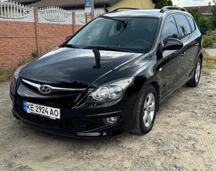 Чорний Хендай i30, об'ємом двигуна 1.6 л та пробігом 209 тис. км за 7300 $, фото 1 на Automoto.ua