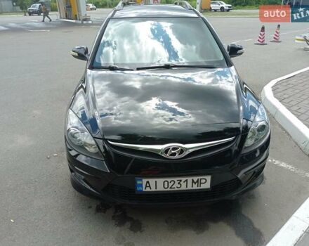Черный Хендай i30, объемом двигателя 1.6 л и пробегом 271 тыс. км за 7200 $, фото 1 на Automoto.ua