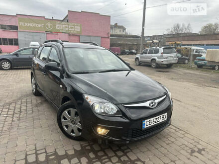 Черный Хендай i30, объемом двигателя 1.58 л и пробегом 175 тыс. км за 7500 $, фото 1 на Automoto.ua