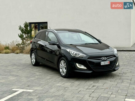 Черный Хендай i30, объемом двигателя 1.6 л и пробегом 202 тыс. км за 12500 $, фото 1 на Automoto.ua