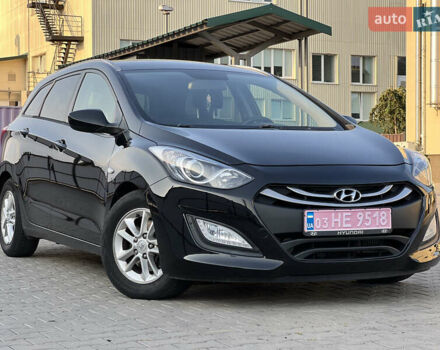 Черный Хендай i30, объемом двигателя 1.58 л и пробегом 248 тыс. км за 7800 $, фото 1 на Automoto.ua