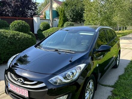 Черный Хендай i30, объемом двигателя 1.6 л и пробегом 167 тыс. км за 8400 $, фото 1 на Automoto.ua