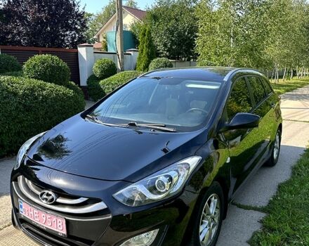 Черный Хендай i30, объемом двигателя 1.6 л и пробегом 167 тыс. км за 8400 $, фото 1 на Automoto.ua