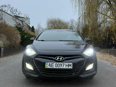 Черный Хендай i30, объемом двигателя 1.4 л и пробегом 200 тыс. км за 8500 $, фото 1 на Automoto.ua