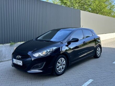 Чорний Хендай i30, об'ємом двигуна 1.4 л та пробігом 212 тис. км за 8500 $, фото 1 на Automoto.ua