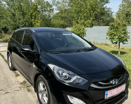 Черный Хендай i30, объемом двигателя 1.6 л и пробегом 167 тыс. км за 8200 $, фото 1 на Automoto.ua