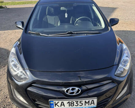 Черный Хендай i30, объемом двигателя 1.58 л и пробегом 160 тыс. км за 10900 $, фото 1 на Automoto.ua