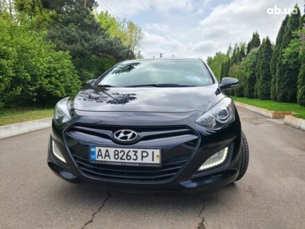 Чорний Хендай i30, об'ємом двигуна 1.6 л та пробігом 106 тис. км за 12500 $, фото 1 на Automoto.ua