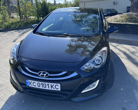 Черный Хендай i30, объемом двигателя 1.58 л и пробегом 124 тыс. км за 13200 $, фото 1 на Automoto.ua