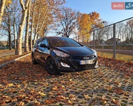 Черный Хендай i30, объемом двигателя 1.58 л и пробегом 132 тыс. км за 9500 $, фото 1 на Automoto.ua