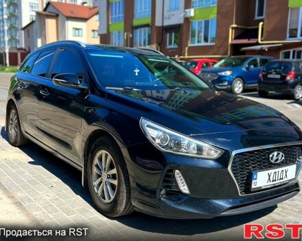 Черный Хендай i30, объемом двигателя 1.6 л и пробегом 275 тыс. км за 12000 $, фото 1 на Automoto.ua