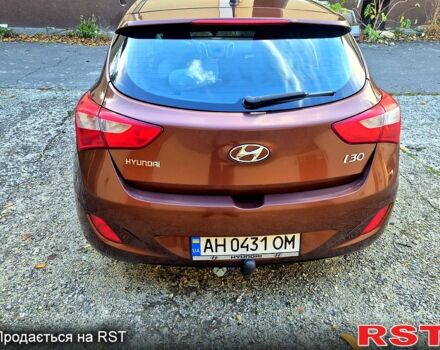 Коричневый Хендай i30, объемом двигателя 1.4 л и пробегом 148 тыс. км за 10500 $, фото 5 на Automoto.ua