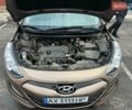 Коричневый Хендай i30, объемом двигателя 1.4 л и пробегом 51 тыс. км за 9400 $, фото 11 на Automoto.ua