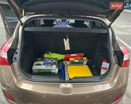 Коричневый Хендай i30, объемом двигателя 1.4 л и пробегом 51 тыс. км за 9400 $, фото 18 на Automoto.ua